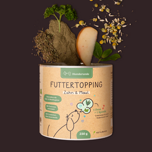 Futtertopping Zahn & Maul is a dog food supplement in powder form with herbs, packaged in a can and includes a wooden spoon.