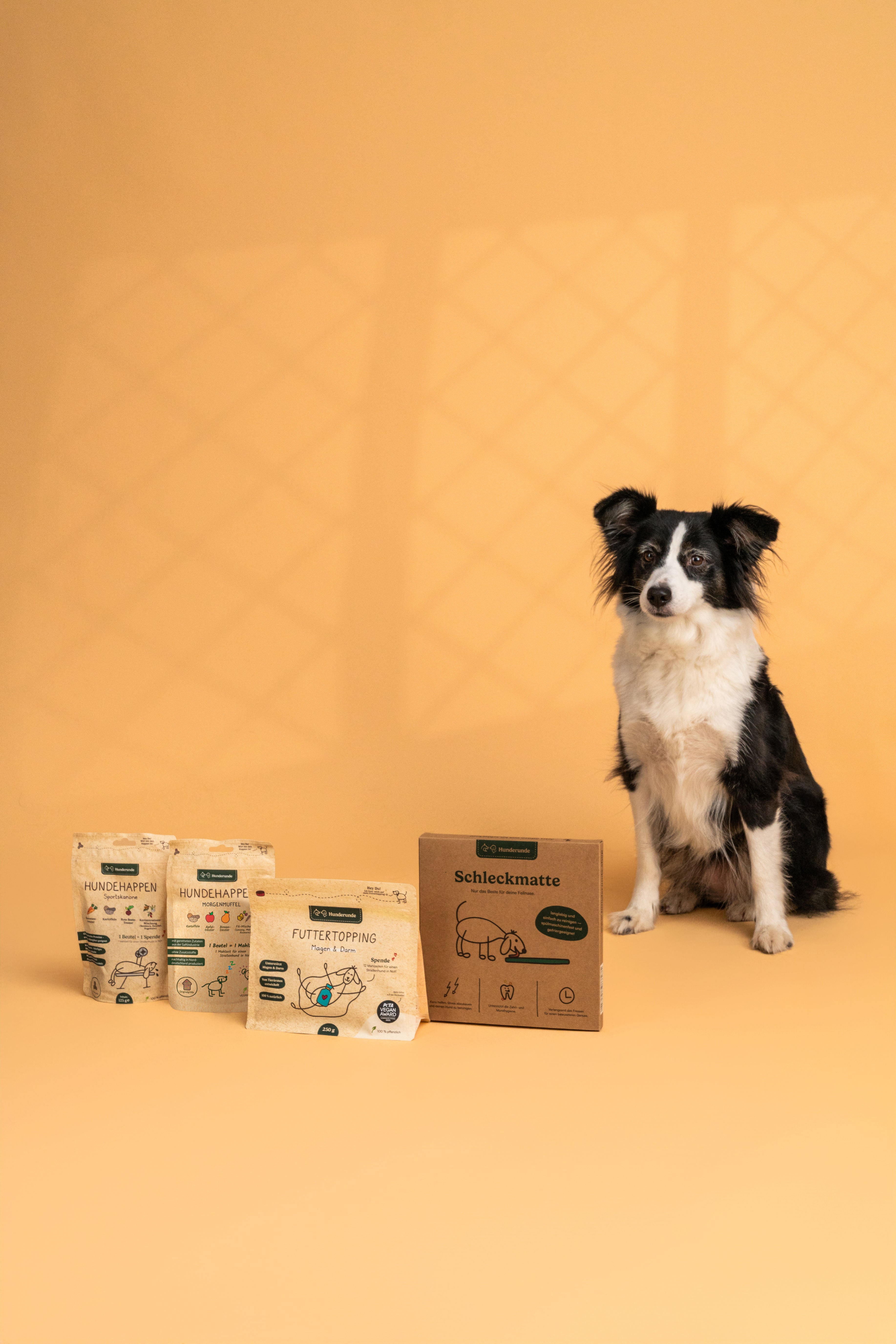 Hund mit Hunderunde Produkten